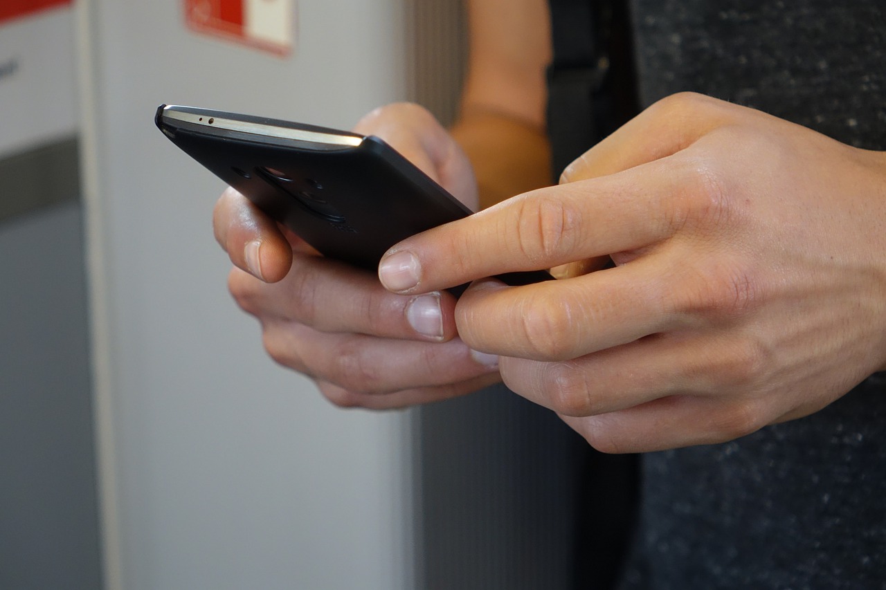 Person's hands on a smartphone