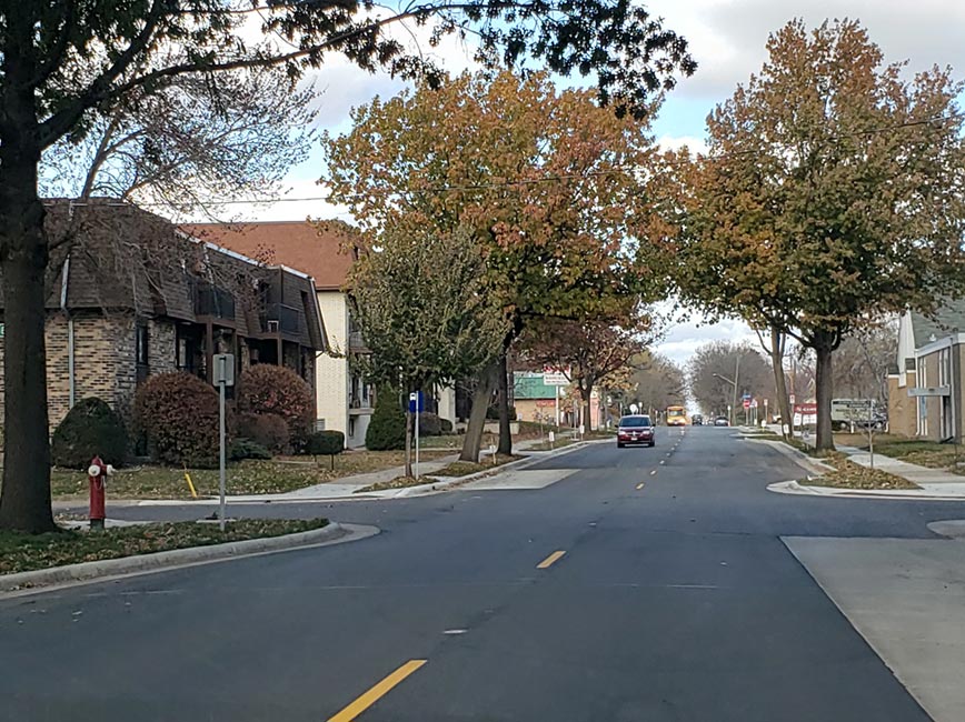 Photo of 34th Ave. with smooth, clean pavement after construction Photo of 34th Ave. with smooth, clean pavement after construction