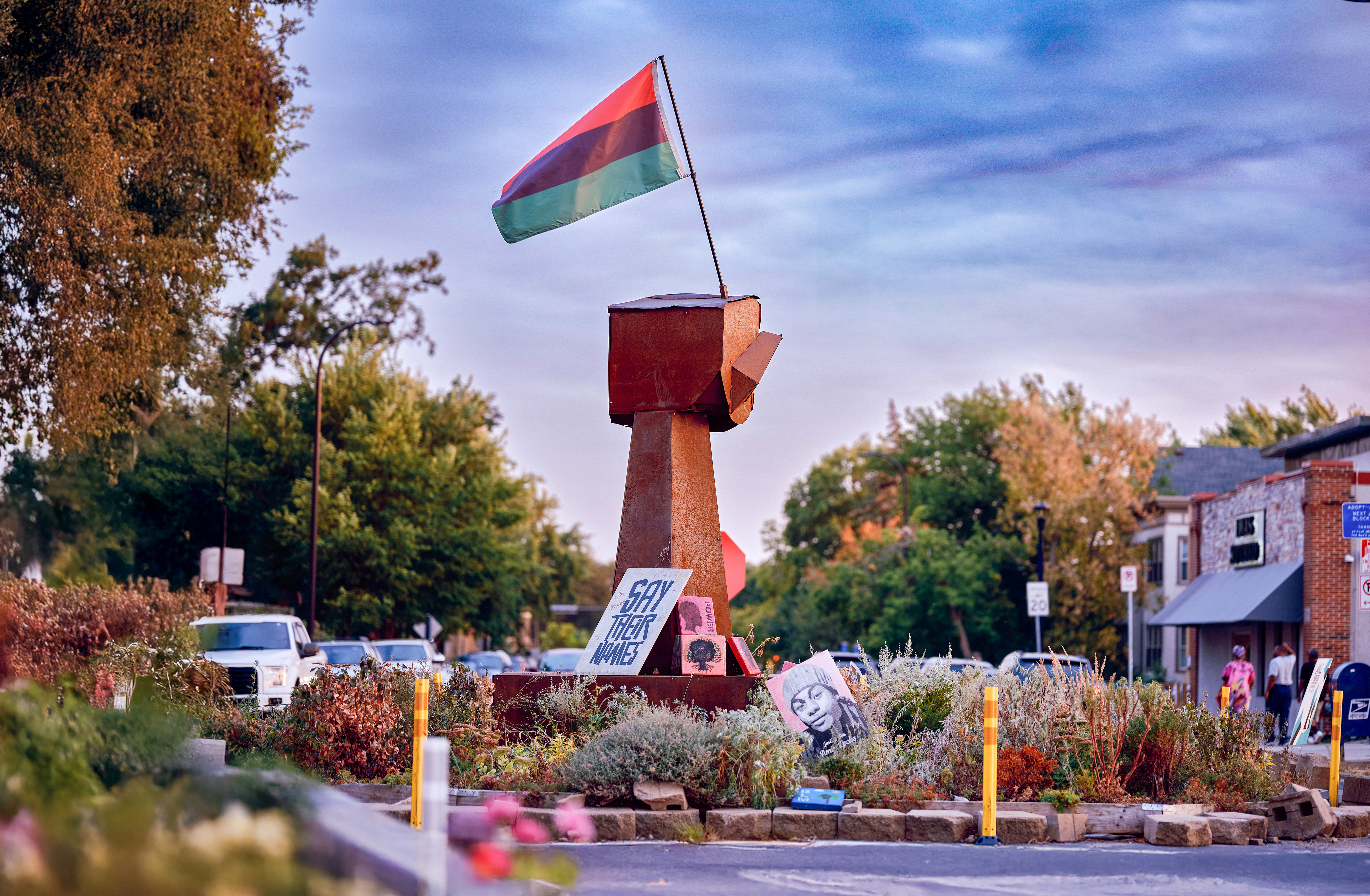 Photo Credit Uche Iroegbu, wooden fist sculpture at the center of George Floyd Square