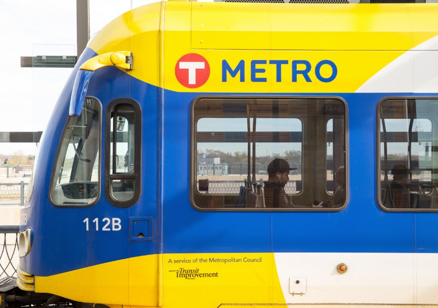 Person on the light rail train