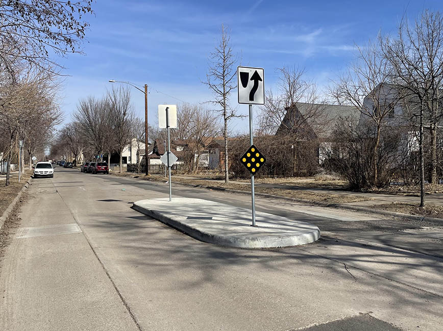 Concrete median mid-block for traffic calming