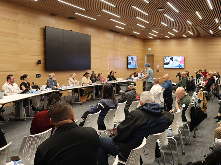 People attending a community meeting