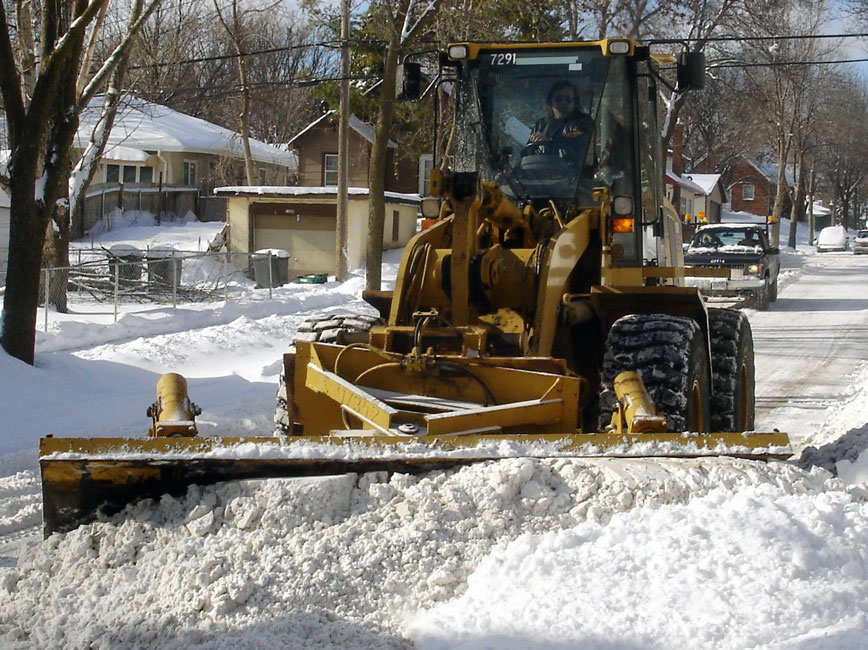 Snow plow on residential street