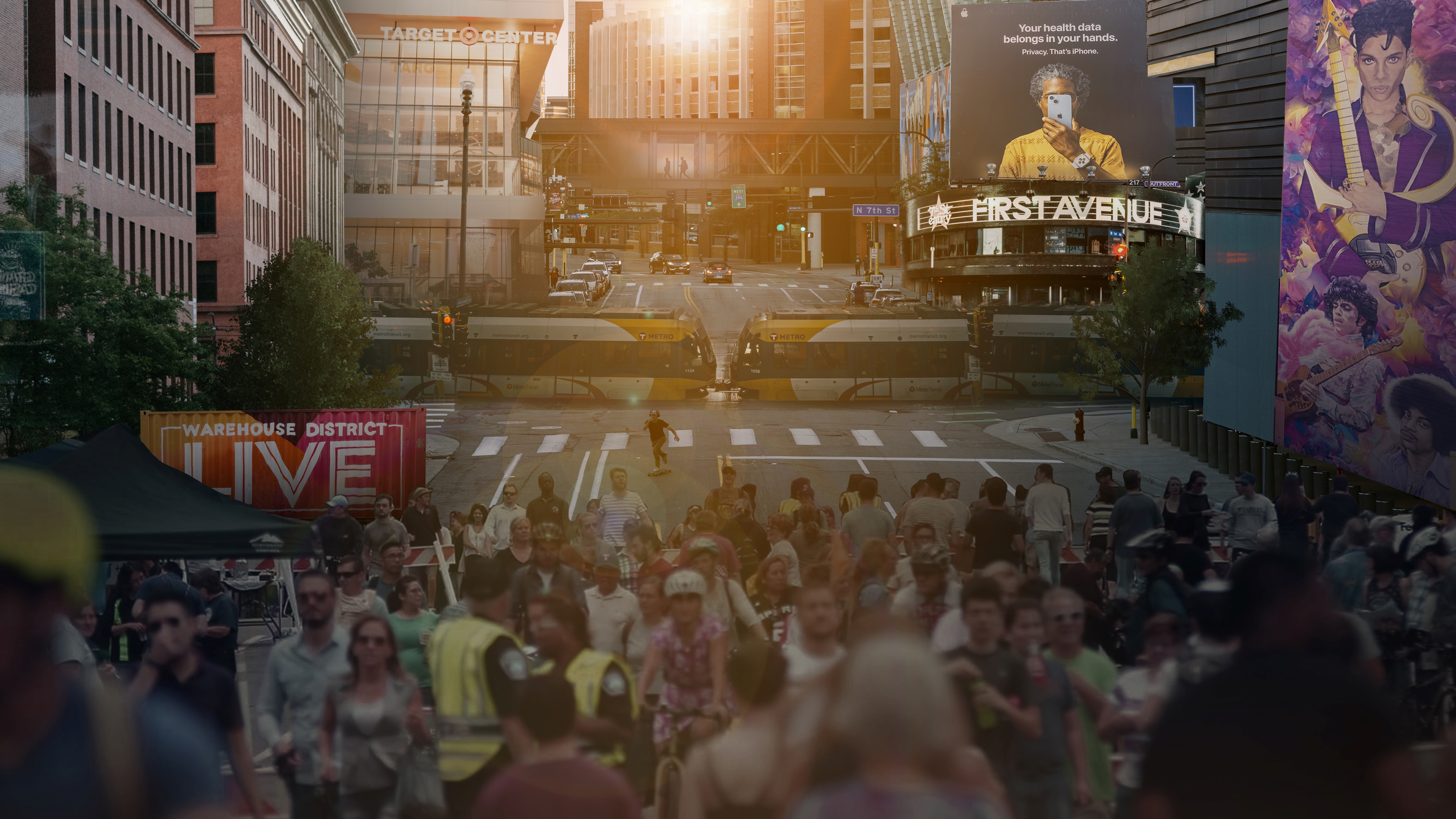 Crowds and buildings along 1st Ave N