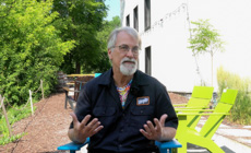 person sitting in front of trees