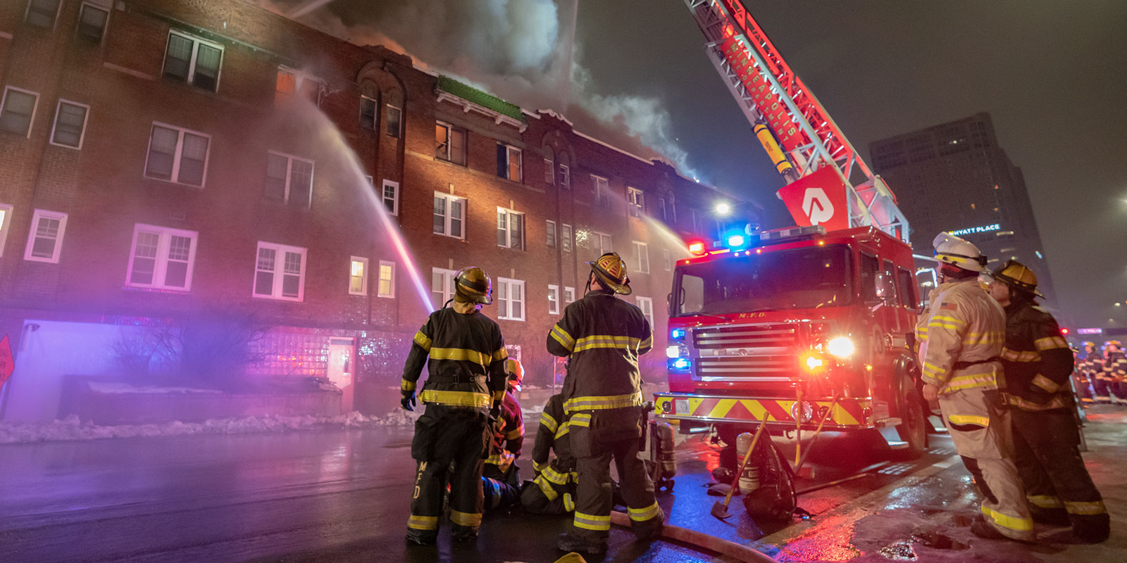 Firefighters battling a fire.