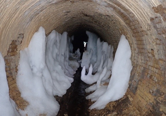 Ice buildup in stormwater tunnel.