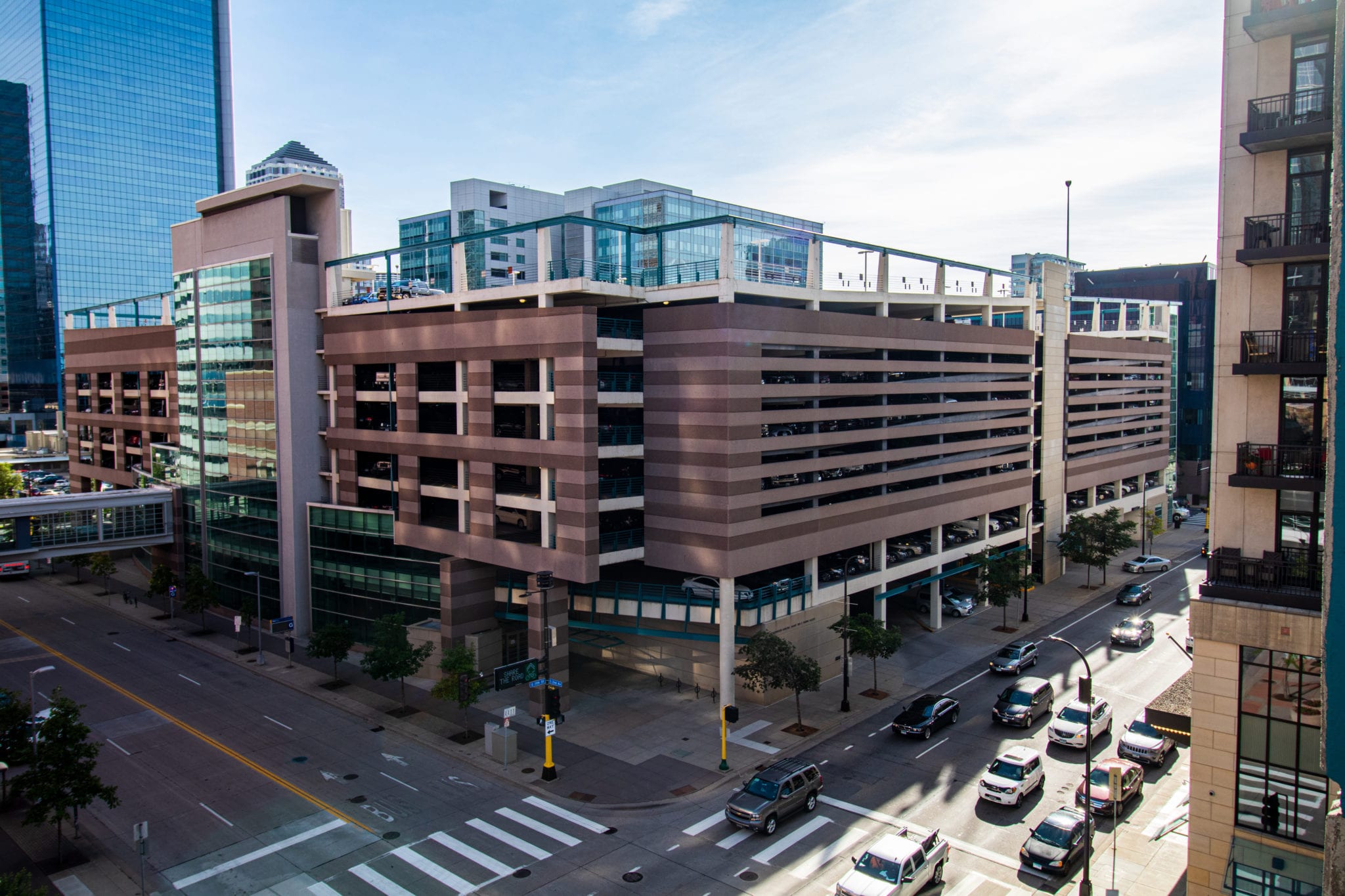 Car drive past Leamington Parking ramp in Minneapolis