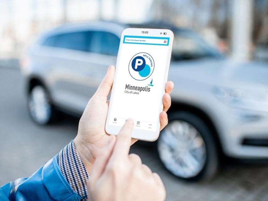 A driver uses the MPLS Parking app to pay for parking