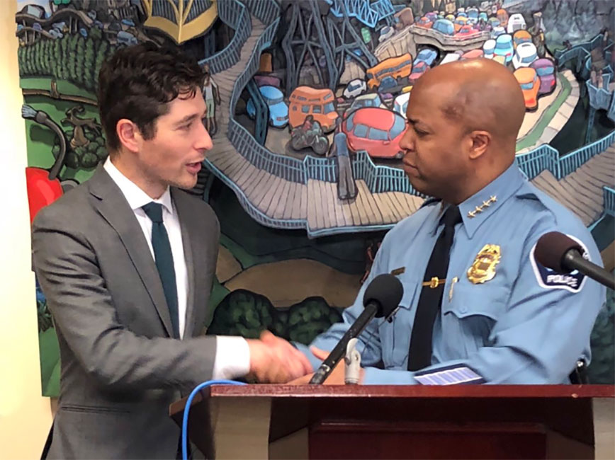 Mayor Frey and Chief Arradondo shake hands at a press conference Mayor Frey and Chief Arradondo shake hands at a press conference