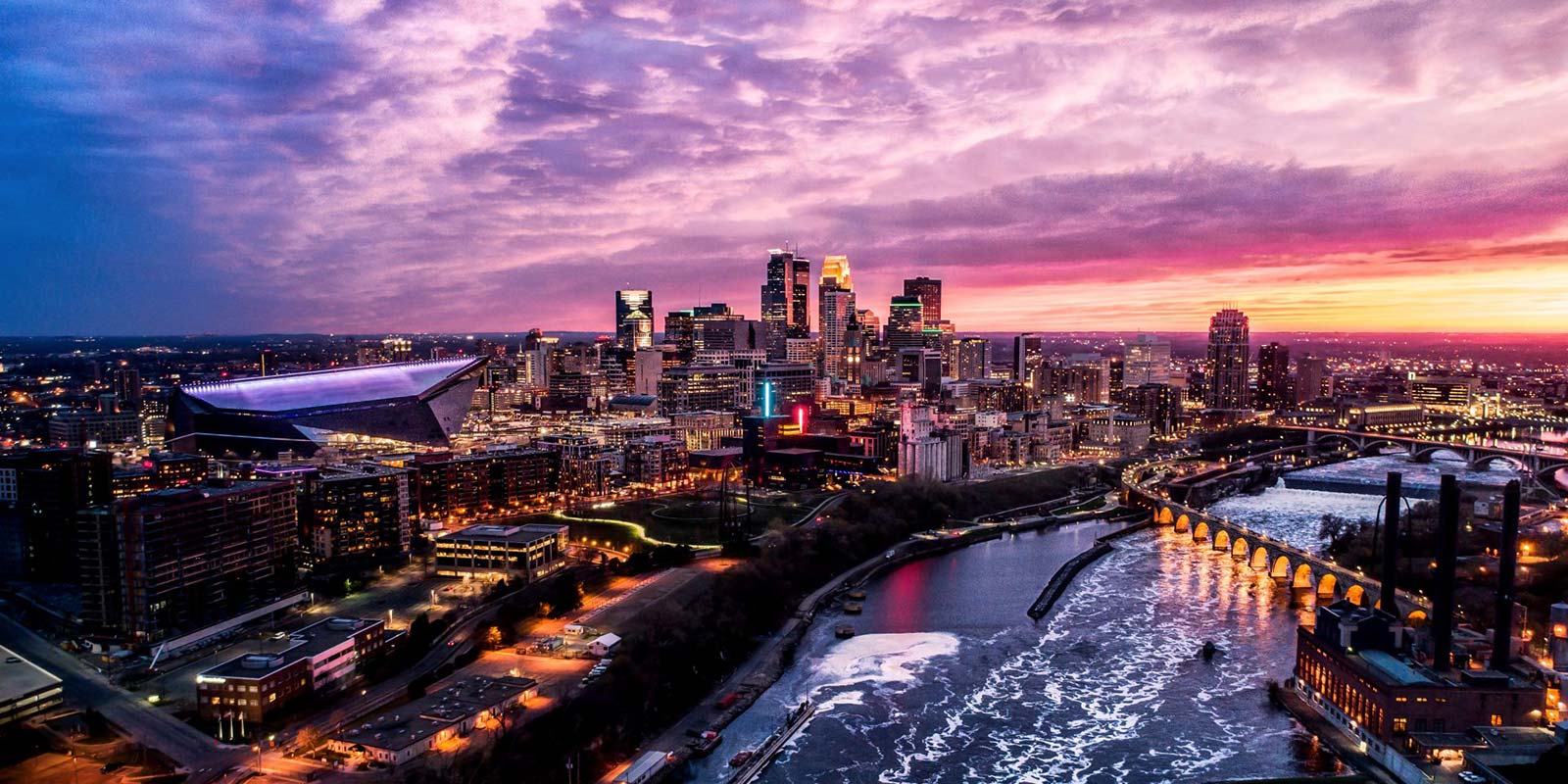 Minneapolis skyline with colorful sunset