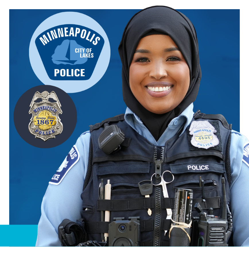 Police Officer wearing blue shirt and navy vest with badges that say Minneapolis Police City of Lakes