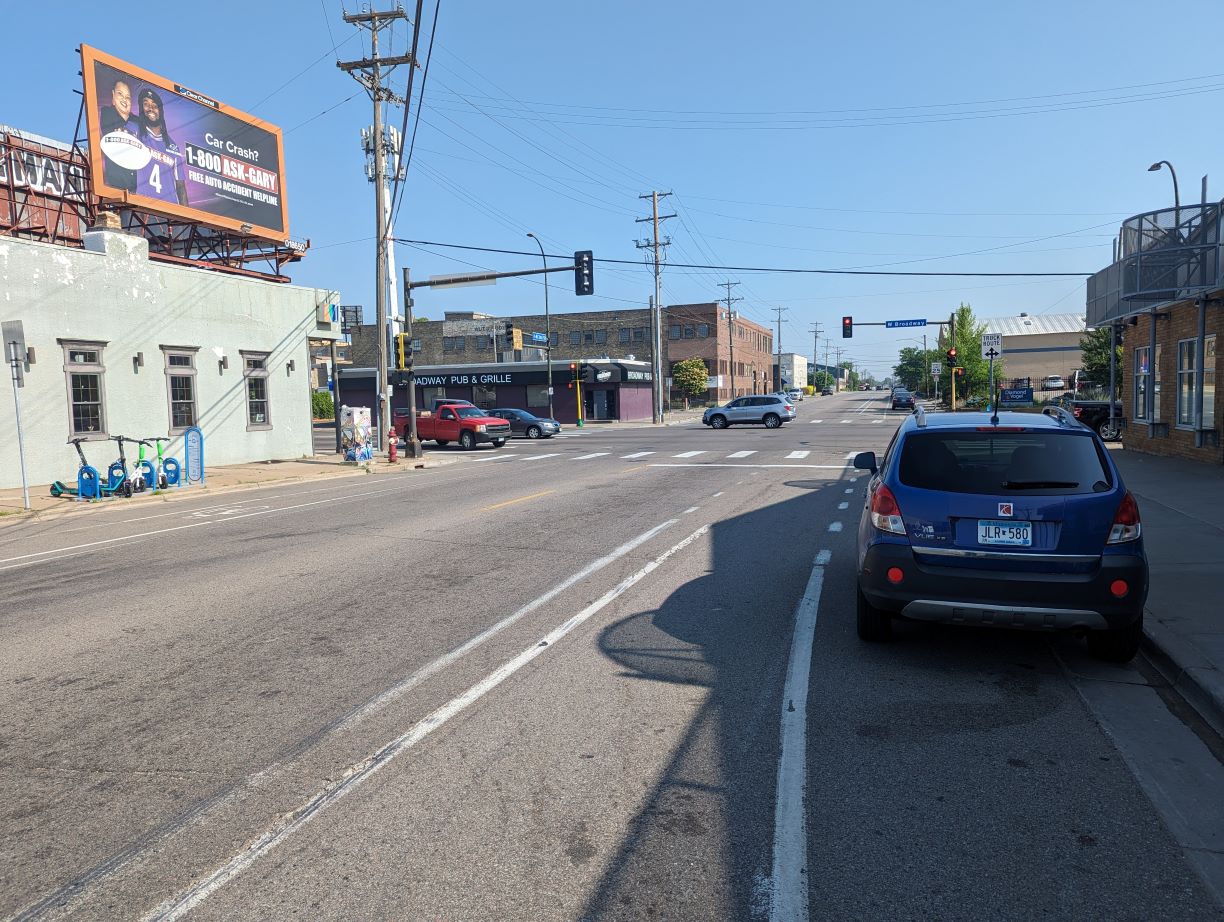 Biker riding along on a two-way protected bike trail