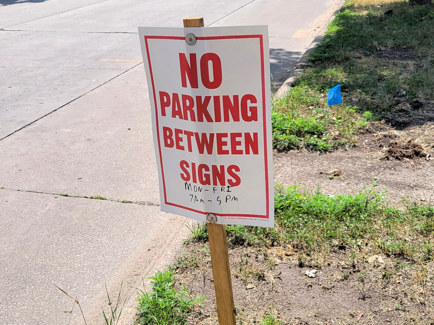 No parking between signs