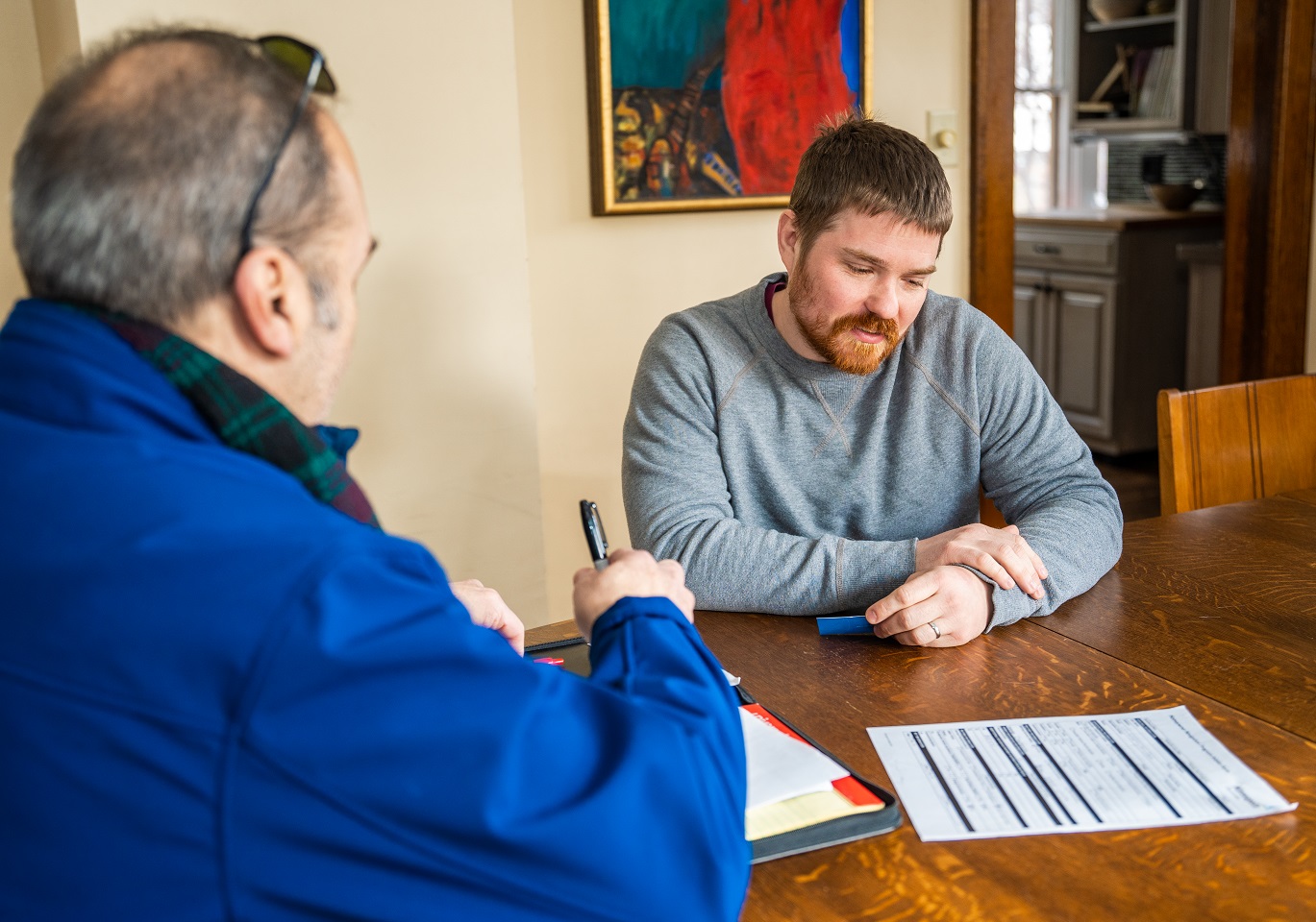 two people looking at document