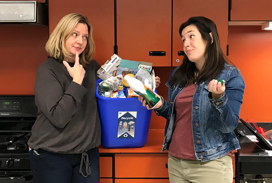 two people questioning if an item is recyclable
