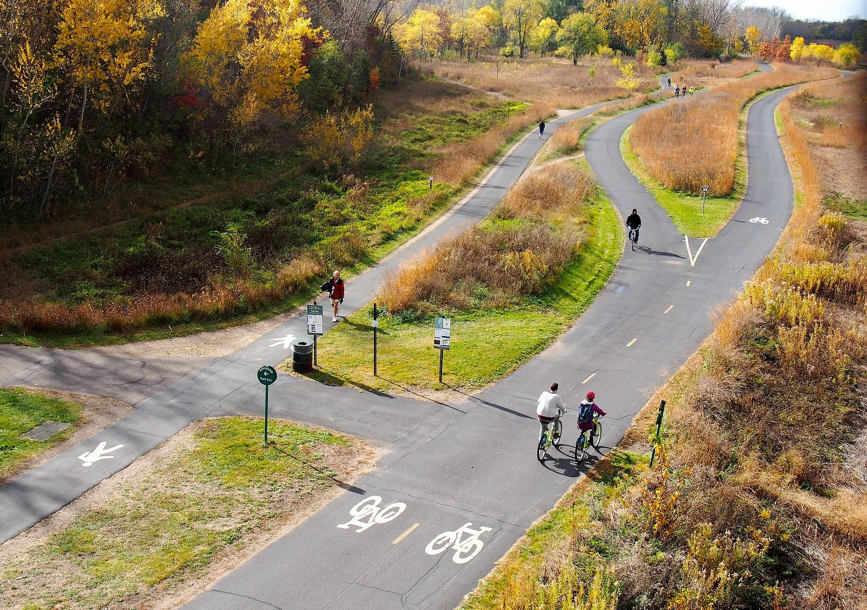 Bicyclists on cedar lake bike trail