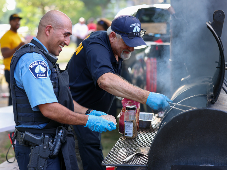Minneapolis Police officers grilling at event