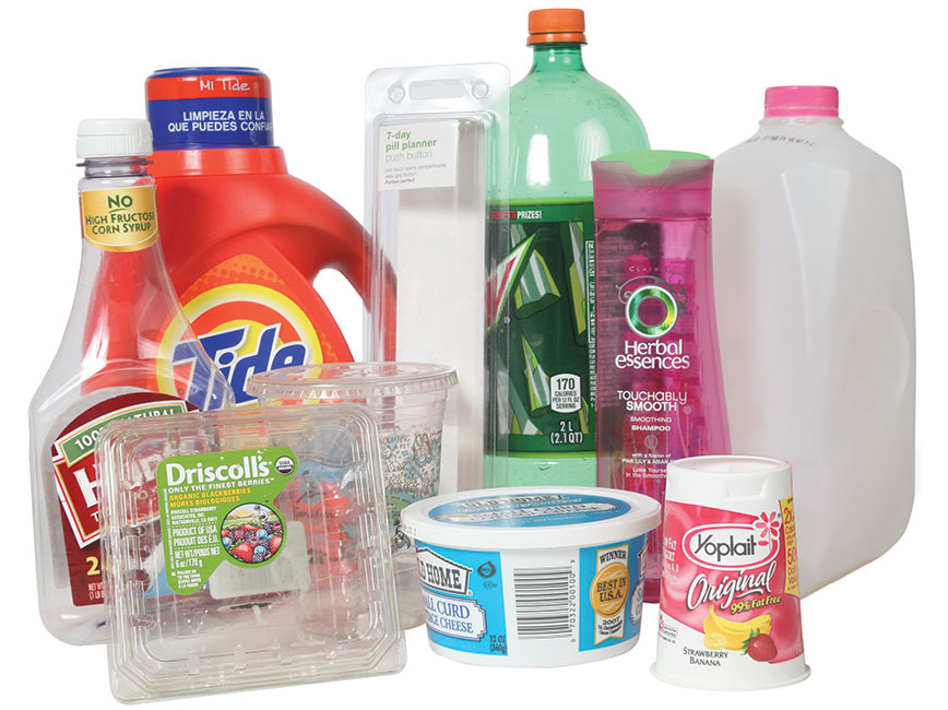 Various plastic containers, such as milk jug and yogurt and berry containers