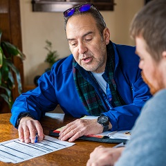 two people looking at document