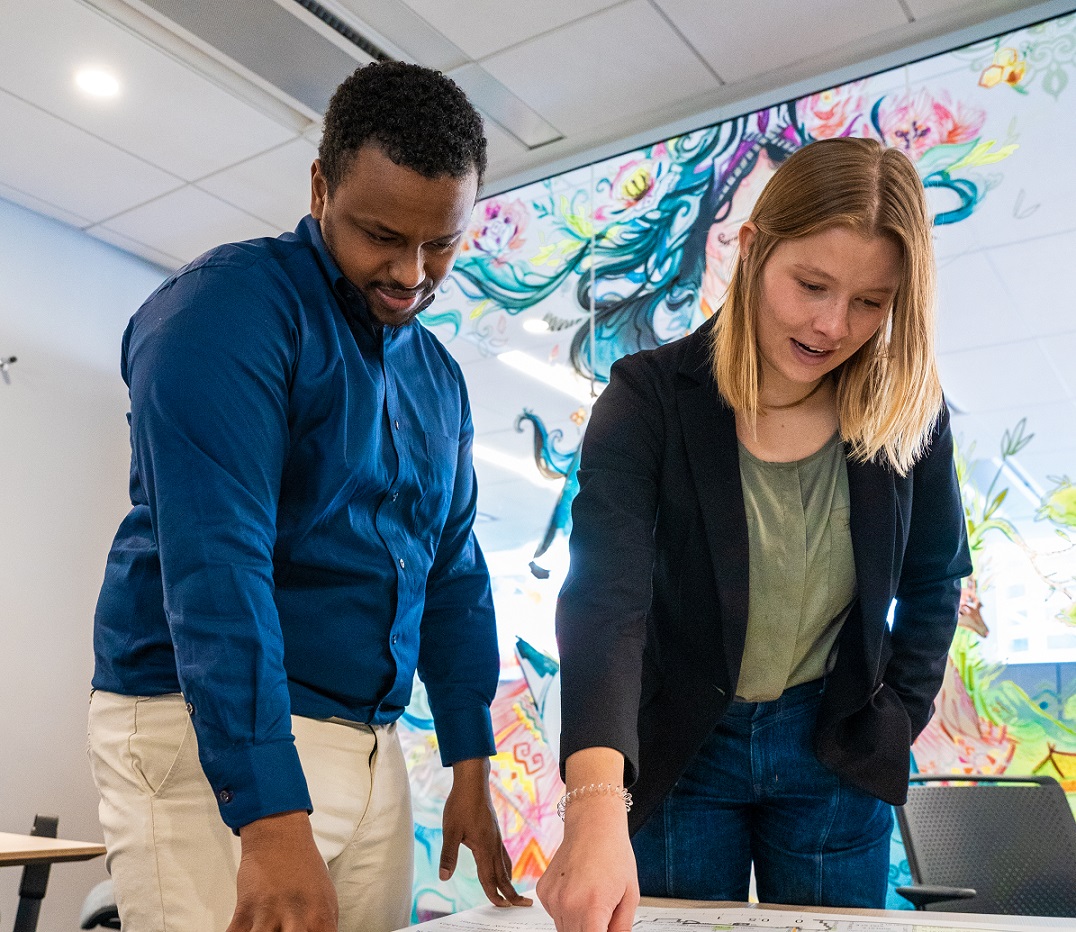 two people looking at document