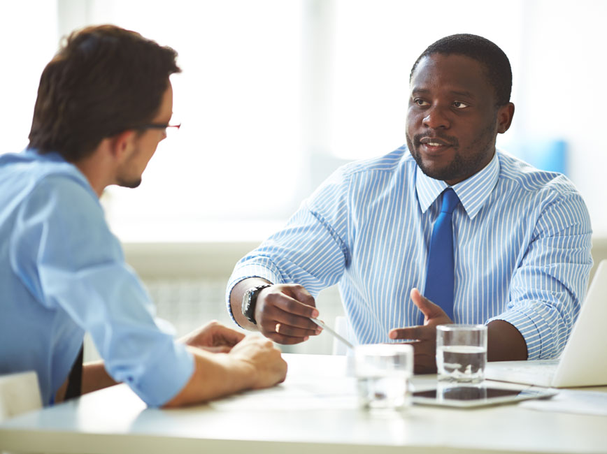 two men having a meeting