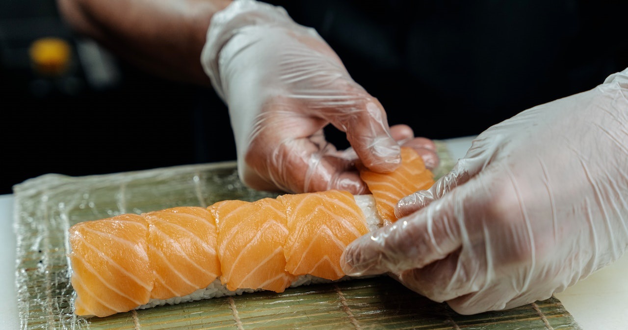 chef preparing sushi