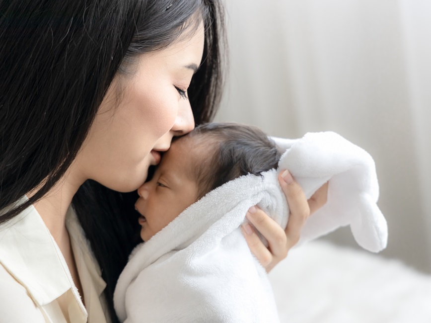 Parent holding infant