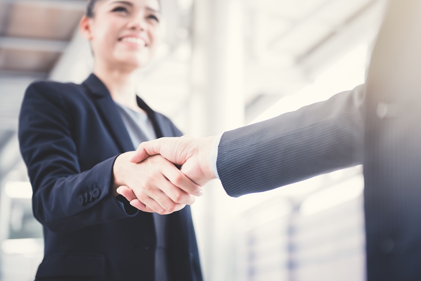 Two people shaking hands Two people shaking hands
