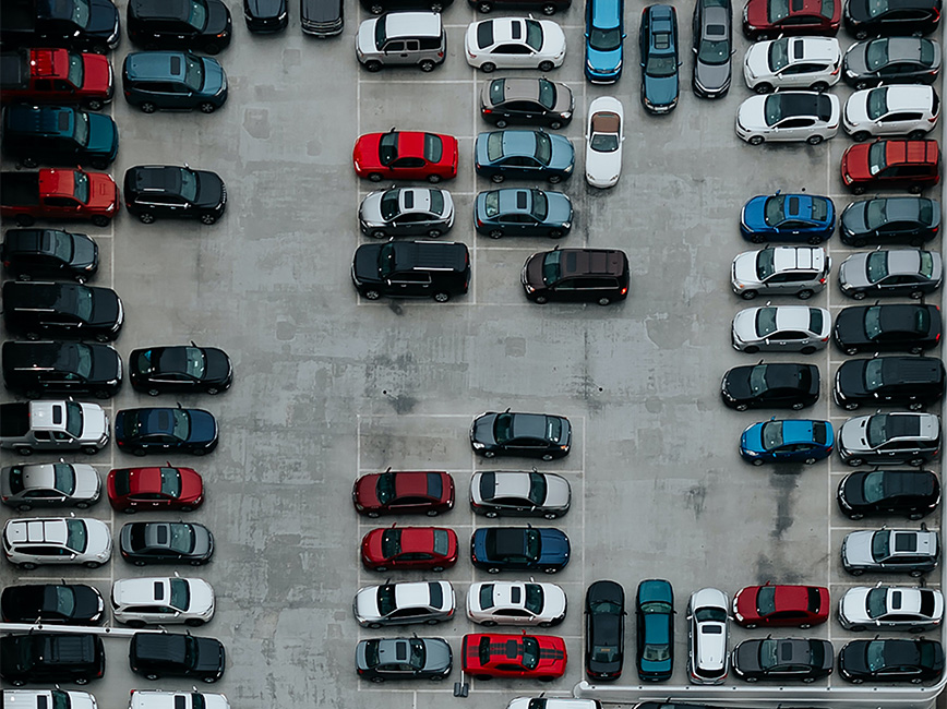 Arial view of parking lot with cars