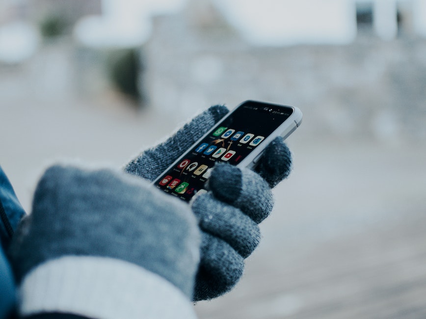 Using phone wearing gloves Using phone wearing gloves