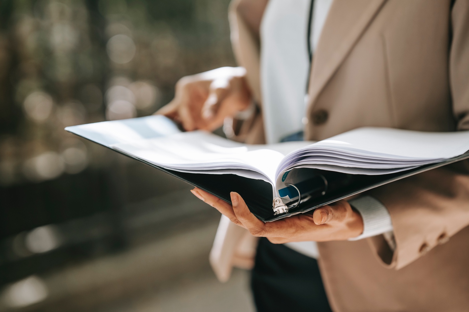 Person holding binder