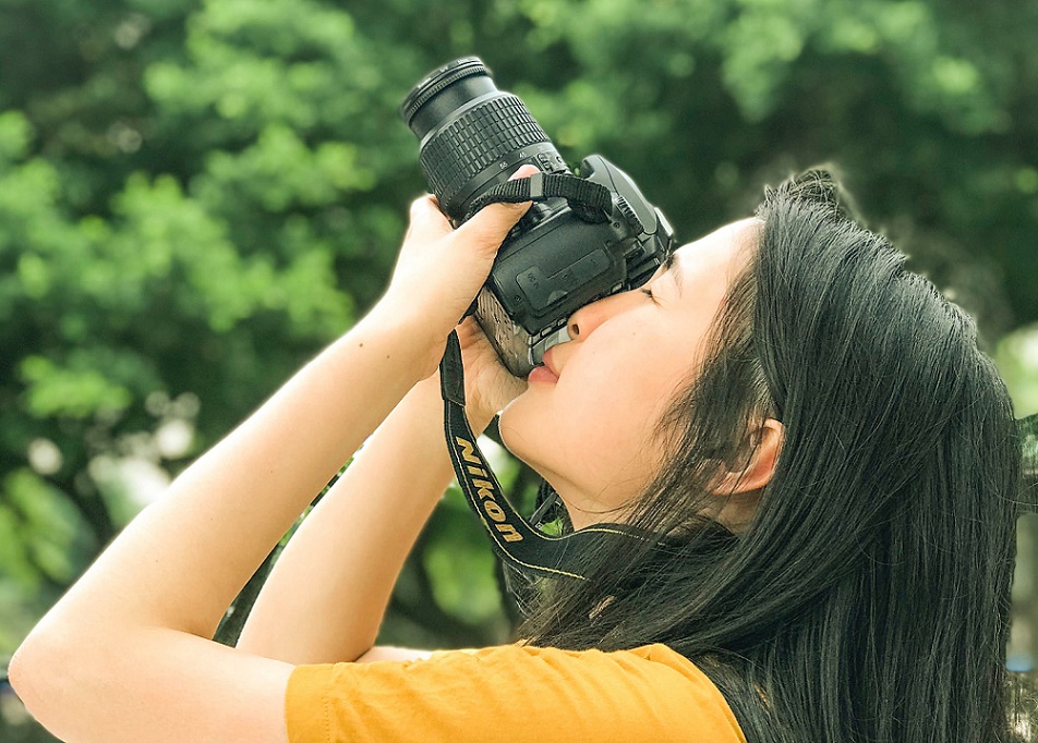 person with a camera pointed up