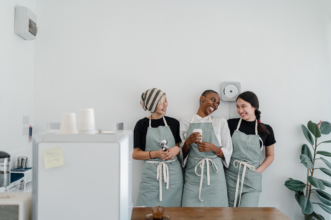 Three teenagers smiling together