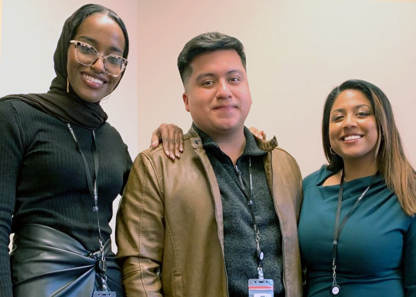 three people smiling three people smiling