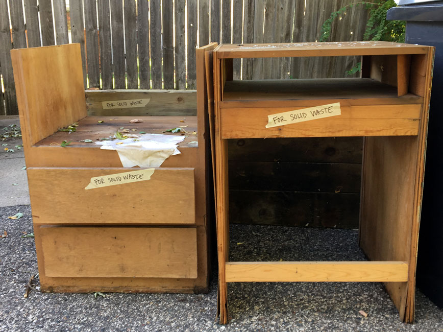 Large wood items set out for collection day.