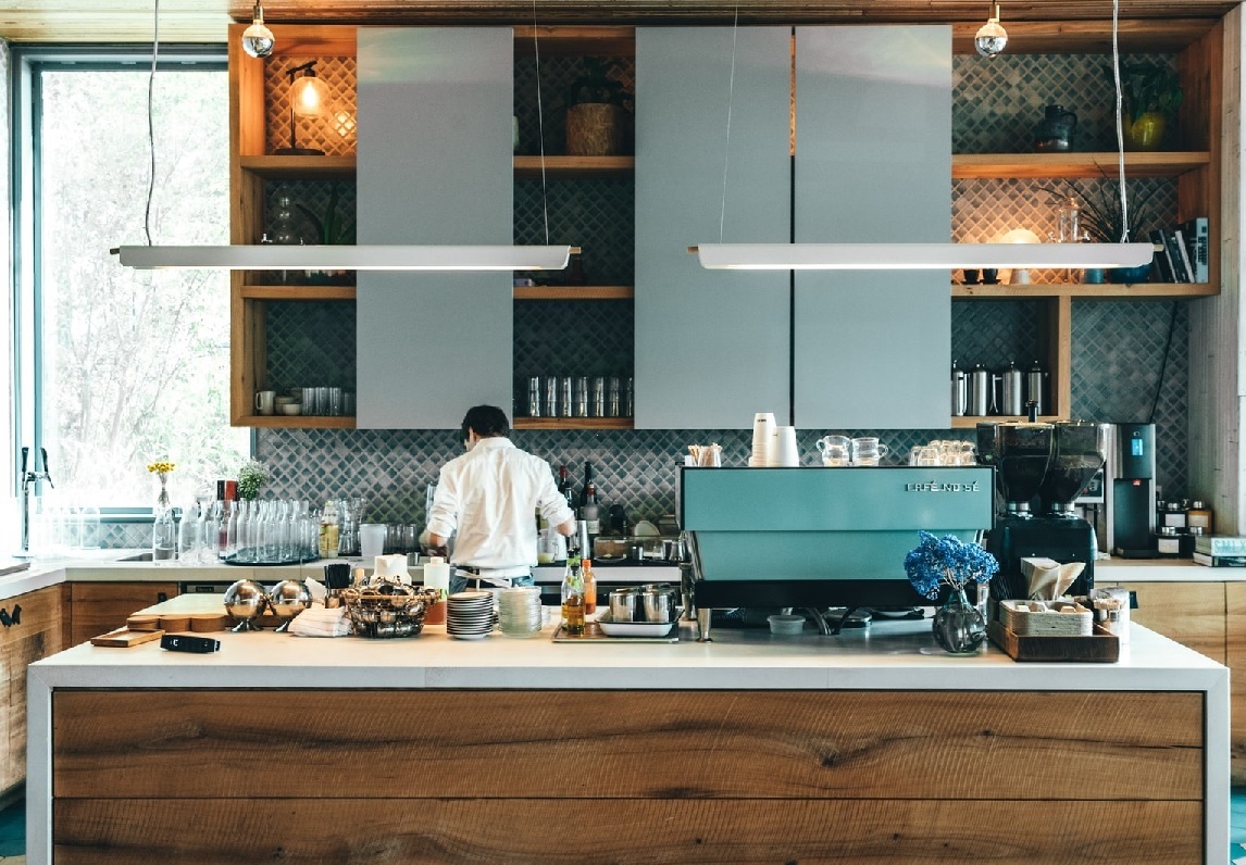 person standing in kitchen
